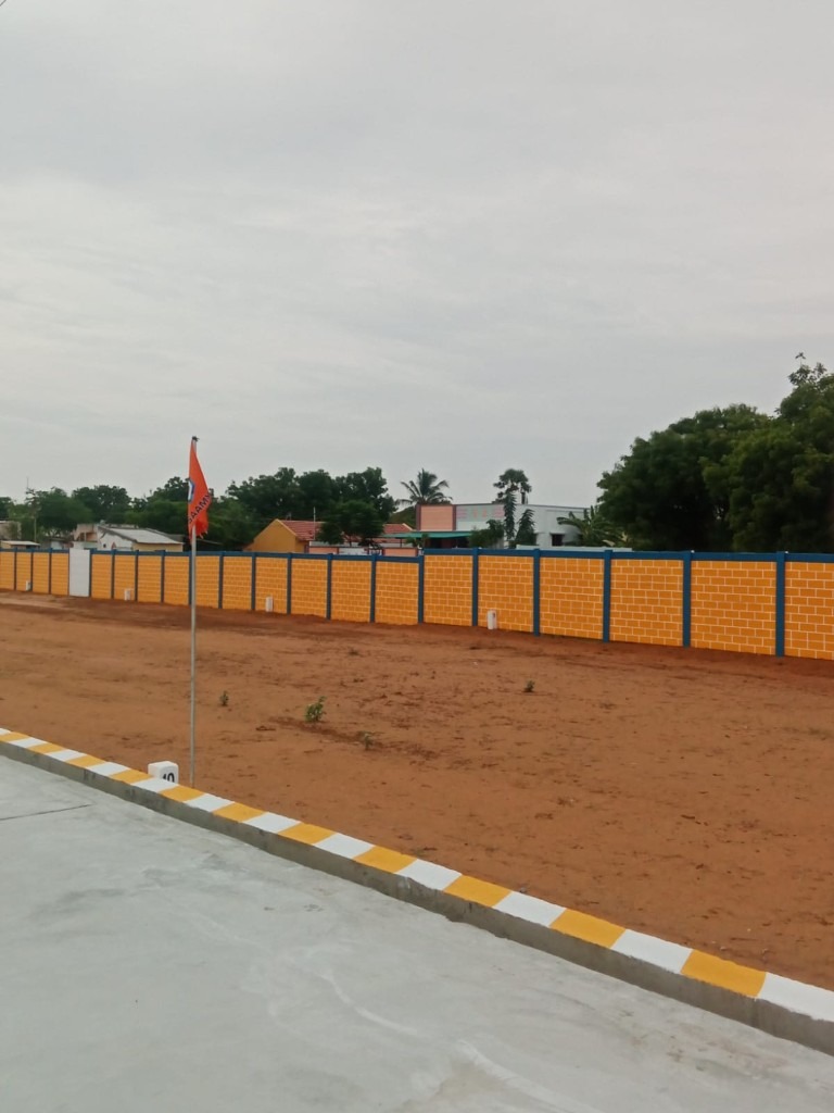 Velu Garden perimeter wall and cleared plots