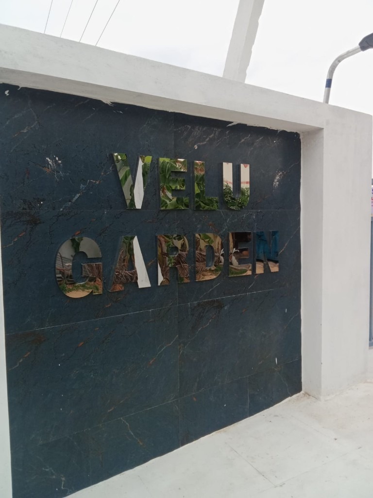 Velu Garden metallic entrance sign