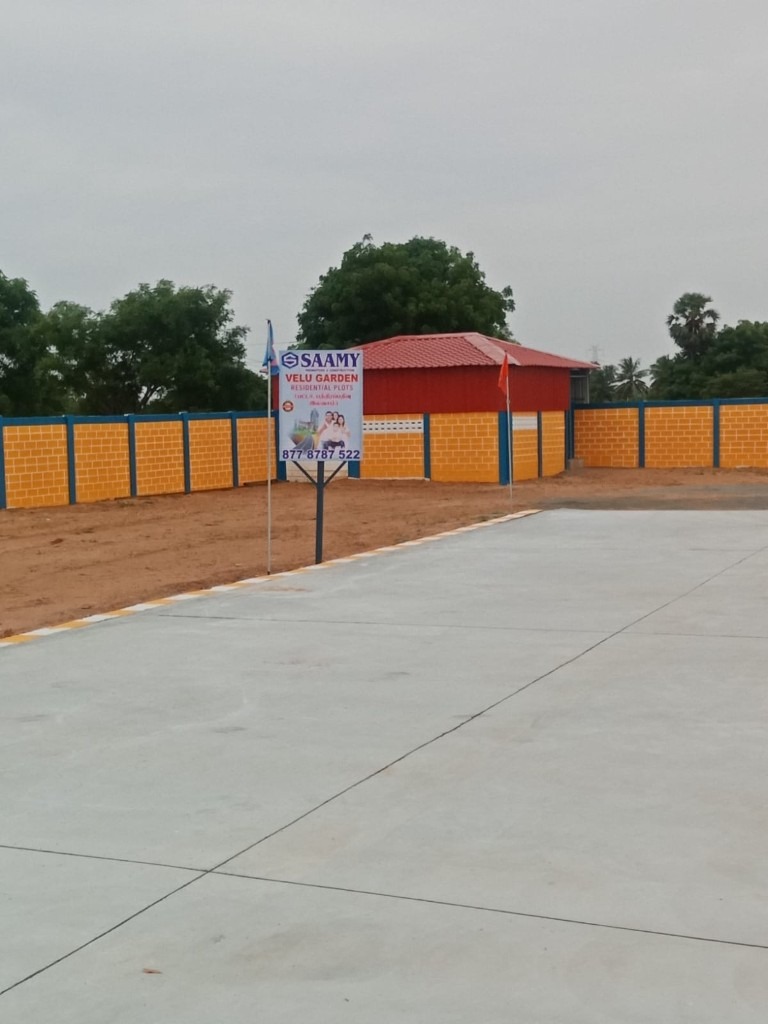 Velu Garden residential plots promotional board
